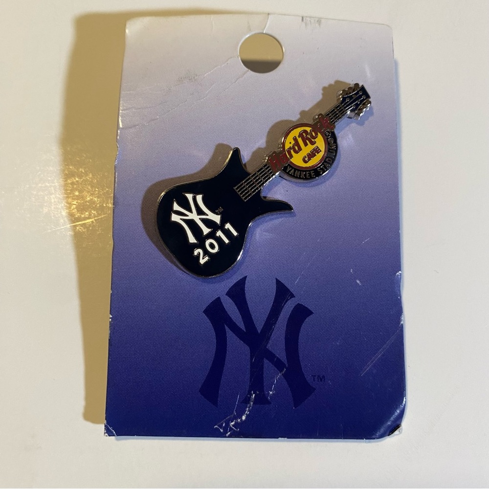 NY Yankee/Hard Rock Cafe 2011 pin on card, never worn, card has some creasing